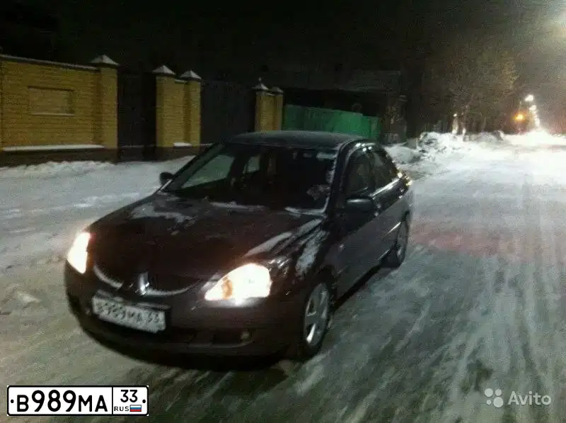 Фото автомобиля MITSUBISHI LANCER, 2005 — госномер В989МА33. Цвет: Серый