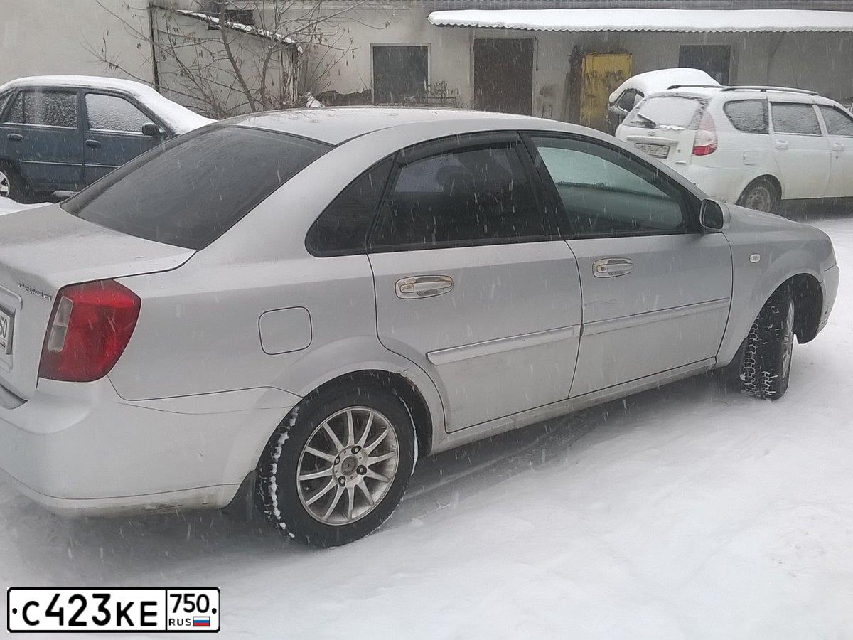 Фото автомобиля CHEVROLET LACETTI, 2007 — госномер С423КЕ750. Цвет: СЕРЕБРИСТЫЙ