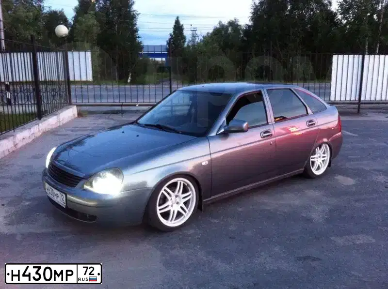 Фото автомобиля TOYOTA COROLLA, 2010 — госномер Н430МР72. Цвет: СЕРЫЙ