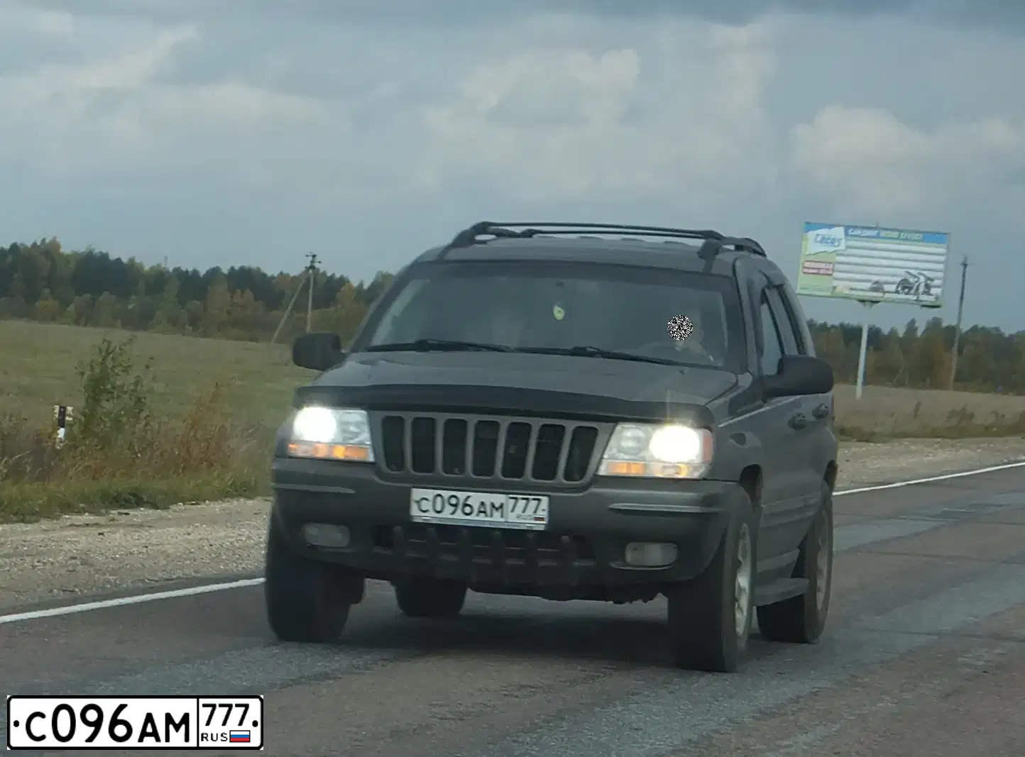 Фото автомобиля JEEP GRAND CHEROKEE, 1999 — госномер С096АМ777. Цвет: СЕРЫЙ ТЕМНЫЙ