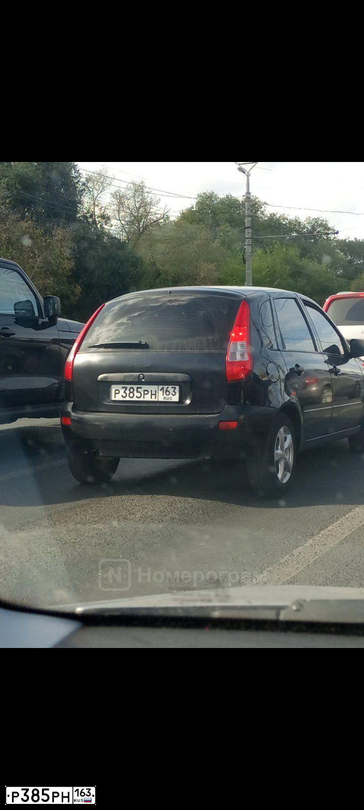 Фото автомобиля LADA 1119 KALINA, 2012 — госномер Р385РН163. Цвет: СИНЕ-ЧЕРНЫЙ