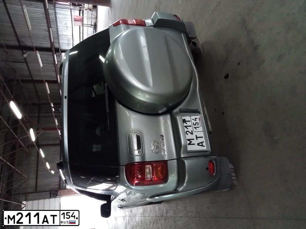 Фото автомобиля TOYOTA RAV4, 2004 — госномер М211АТ154. Цвет: СВЕТЛО-ЗЕЛЕНЫЙ