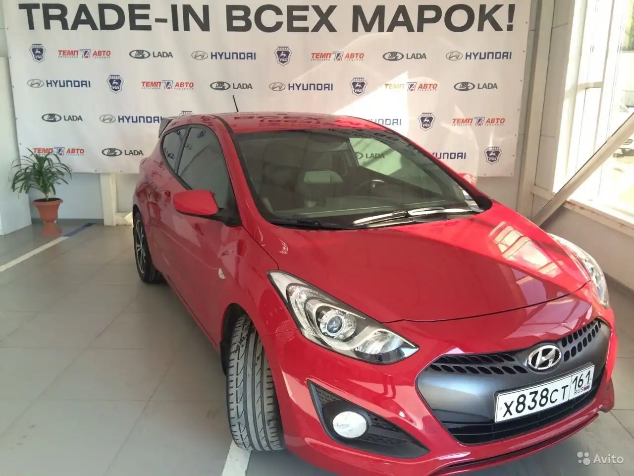 Фото автомобиля HYUNDAI I30, 2013 — госномер Е130ТС797. Цвет: Красный
