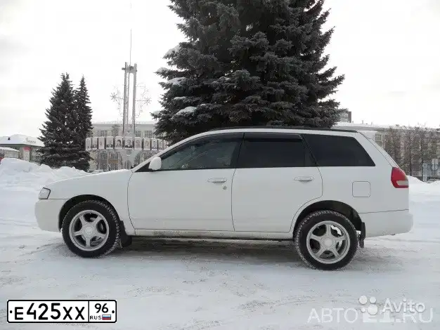Фото автомобиля NISSAN WINGROAD, 2000 — госномер Е338СН196