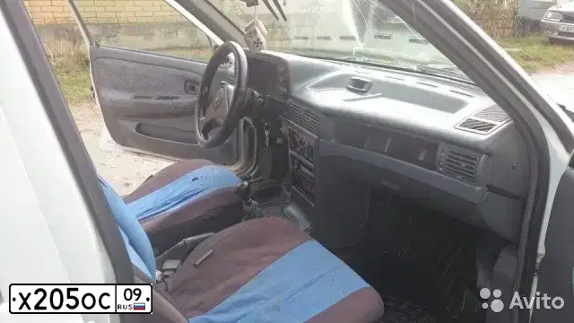 Фото автомобиля DAEWOO NEXIA, 1997 — госномер Н246ТА90. Цвет: Белый