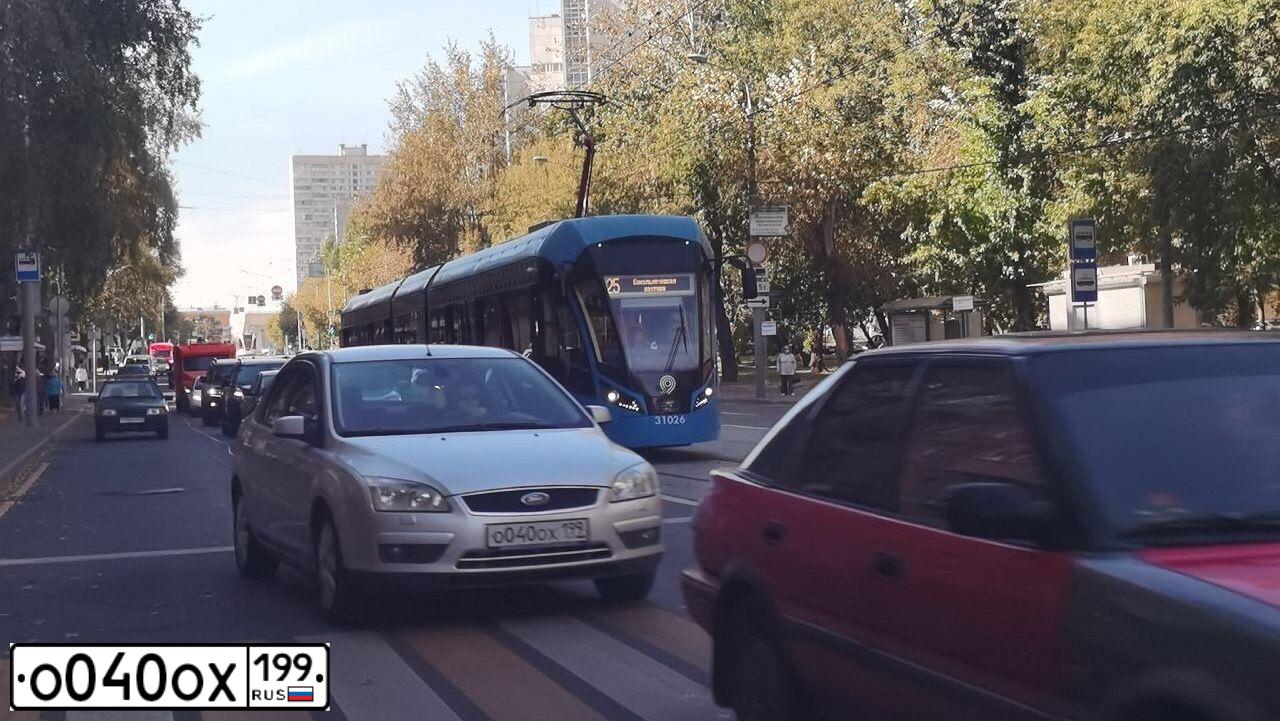 Фото автомобиля FORD FOCUS, 2007 — госномер О040ОХ199. Цвет: СЕРЫЙ МЕТАЛЛИК