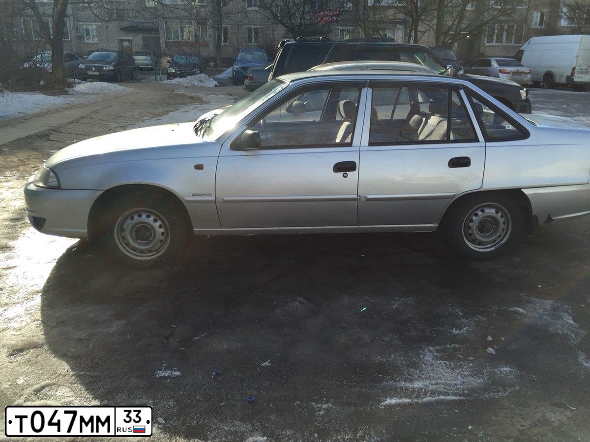 Фото автомобиля DAEWOO NEXIA, 2011 — госномер М001АР68. Цвет: СЕРЕБРИСТЫЙ