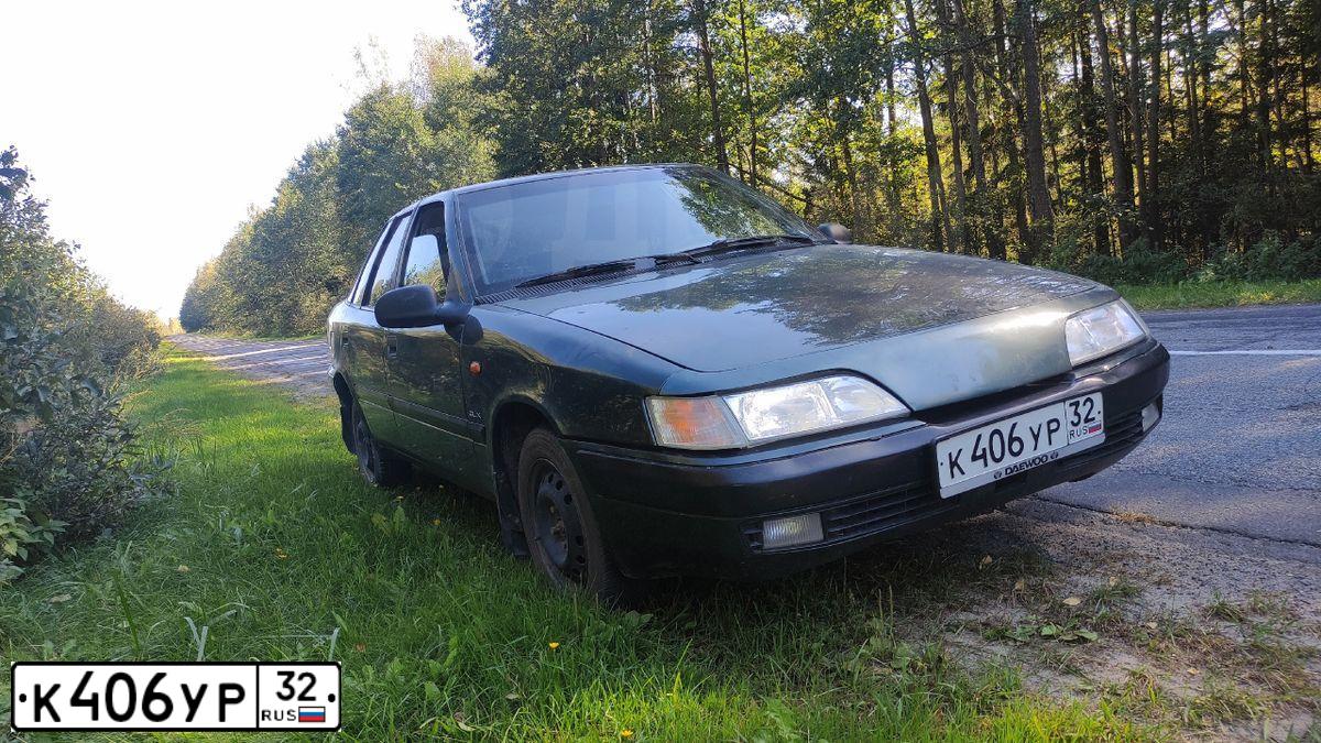Фото автомобиля DAEWOO ESPERO, 1998 — госномер К406УР32. Цвет: ТЕМНО-СЕРЫЙ