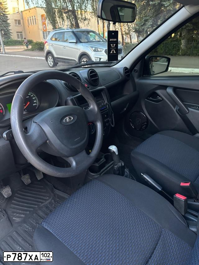 Фото автомобиля LADA 2190 GRANTA, 2014 — госномер А100ЕР56. Цвет: ЗОЛОТИСТО-КОРИЧНЕВЫЙ
