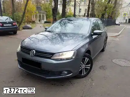 Фото автомобиля VOLKSWAGEN JETTA, 2007 — госномер В387КР76. Цвет: Серый