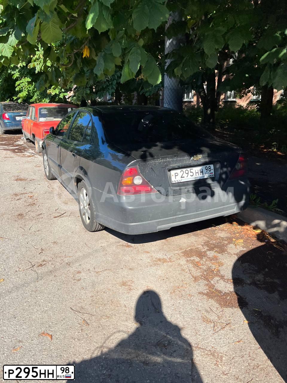 Фото автомобиля DAEWOO EVANDA, 2003 — госномер Р295НН98. Цвет: ЧЕРНЫЙ