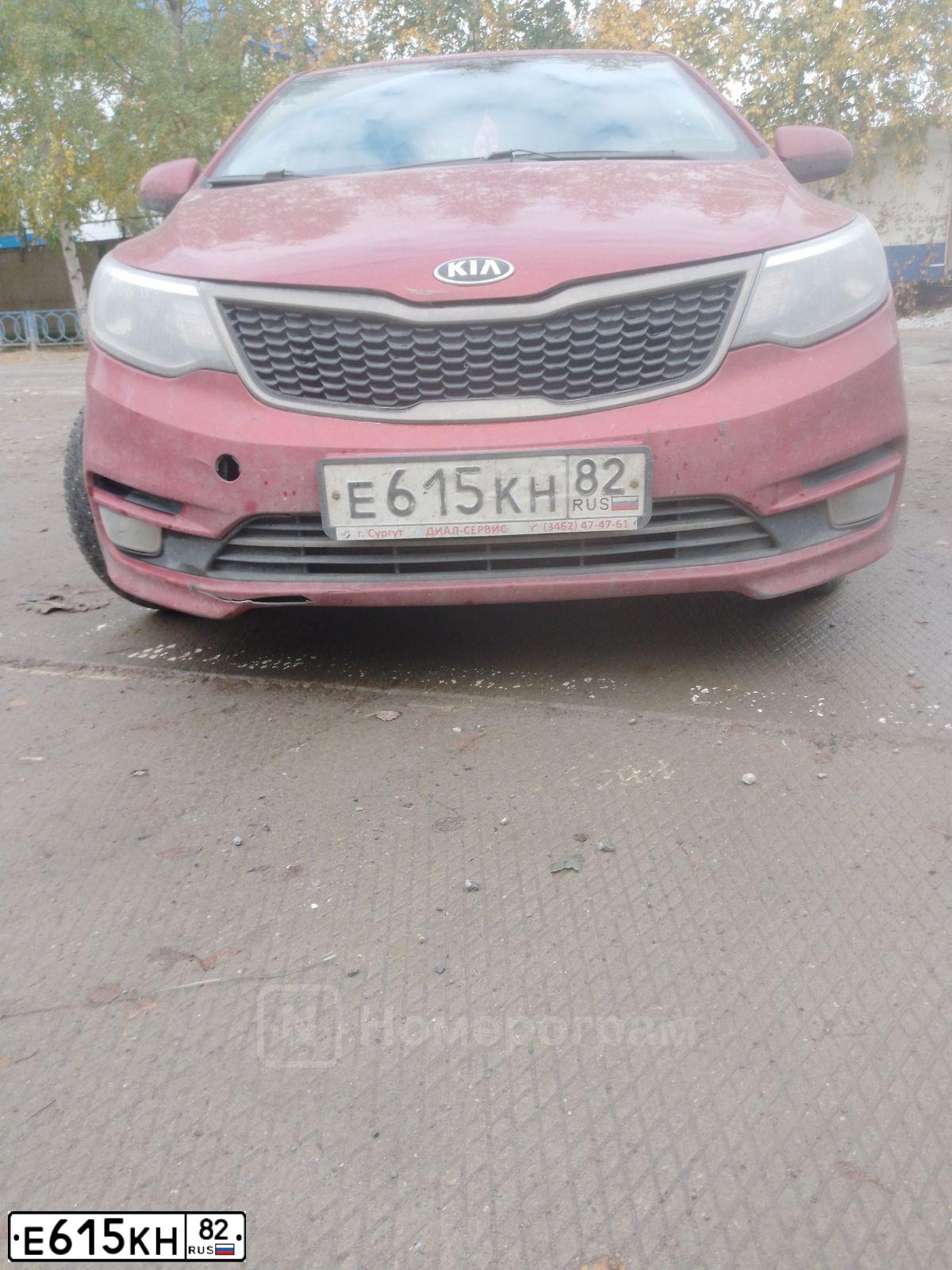 Фото автомобиля KIA RIO, 2016 — госномер Е615КН82. Цвет: КРАСНЫЙ