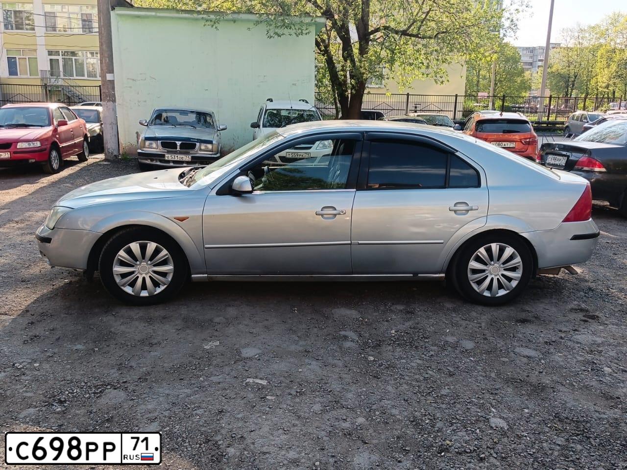 Фото автомобиля MITSUBISHI LANCER, 2003 — госномер С698РР71. Цвет: Серый
