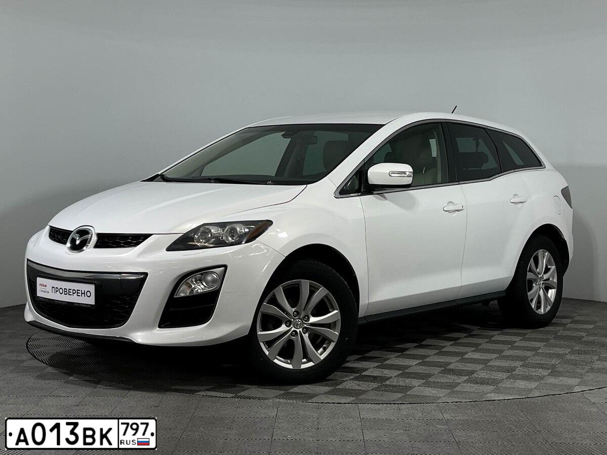 Фото автомобиля MAZDA CX-7, 2010 — госномер К917ЕА977. Цвет: Белый