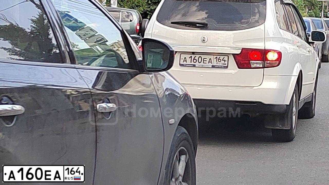 Фото автомобиля SSANGYONG KYRON, 2014 — госномер А160ЕА164. Цвет: БЕЛЫЙ