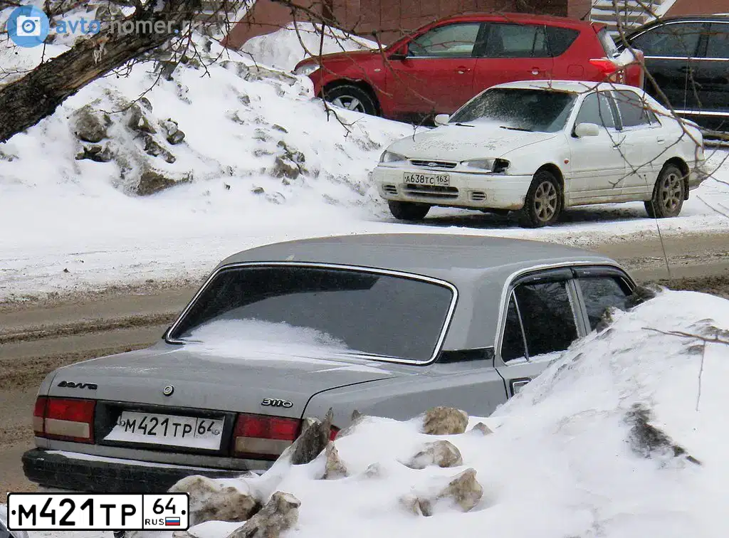 Фото автомобиля GAZ 3110 WOLGA, 1997 — госномер Е614ЕН64. Цвет: СЕРЫЙ