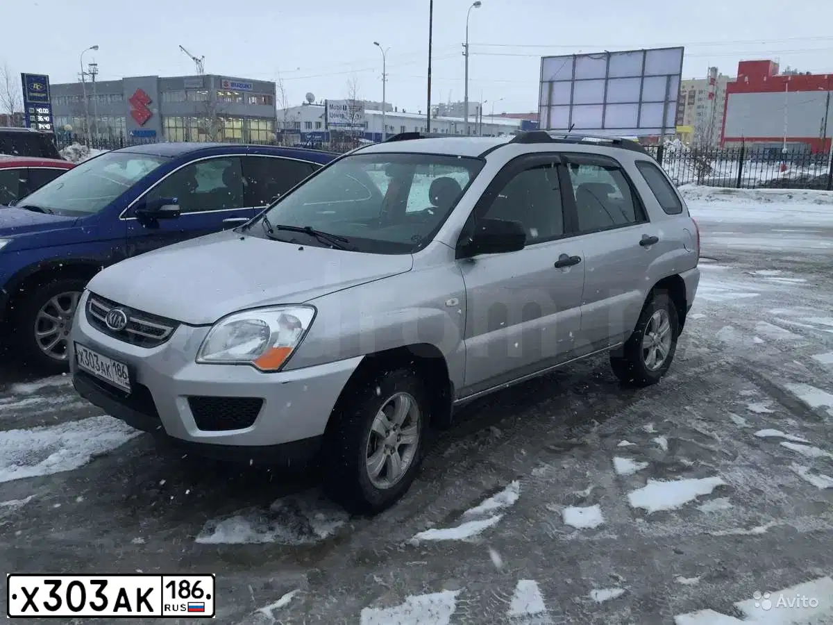 Фото автомобиля KIA SPORTAGE, 2009 — госномер С555ЕЕ21. Цвет: ПЕРЛАМ-СЕРЕБРИСТЫЙ