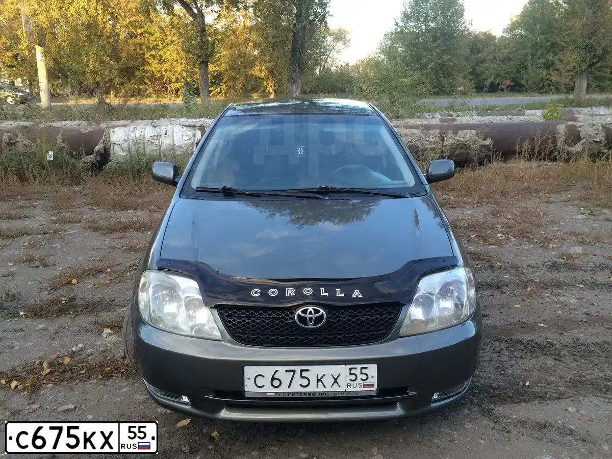 Фото автомобиля TOYOTA COROLLA, 2003 — госномер С428КР47. Цвет: Серый