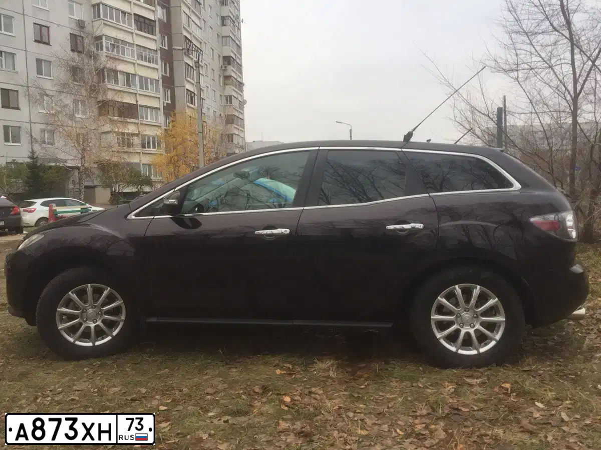 Фото автомобиля MAZDA CX-7, 2008 — госномер К822КУ73. Цвет: ТЕМНО-ВИШНЕВЫЙ