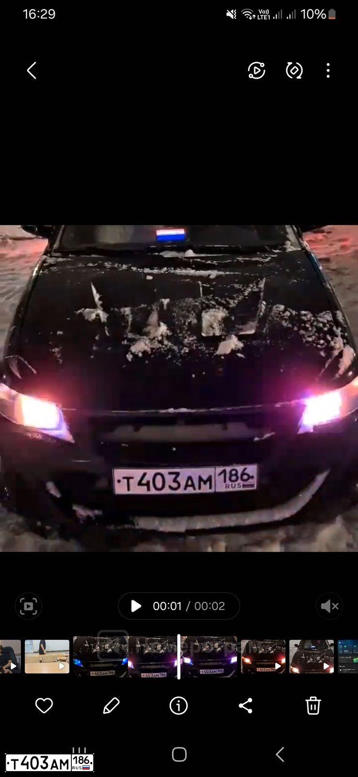 Фото автомобиля LADA 2172 PRIORA, 2011 — госномер Т403АМ186. Цвет: СИНЕ-ЧЕРНЫЙ