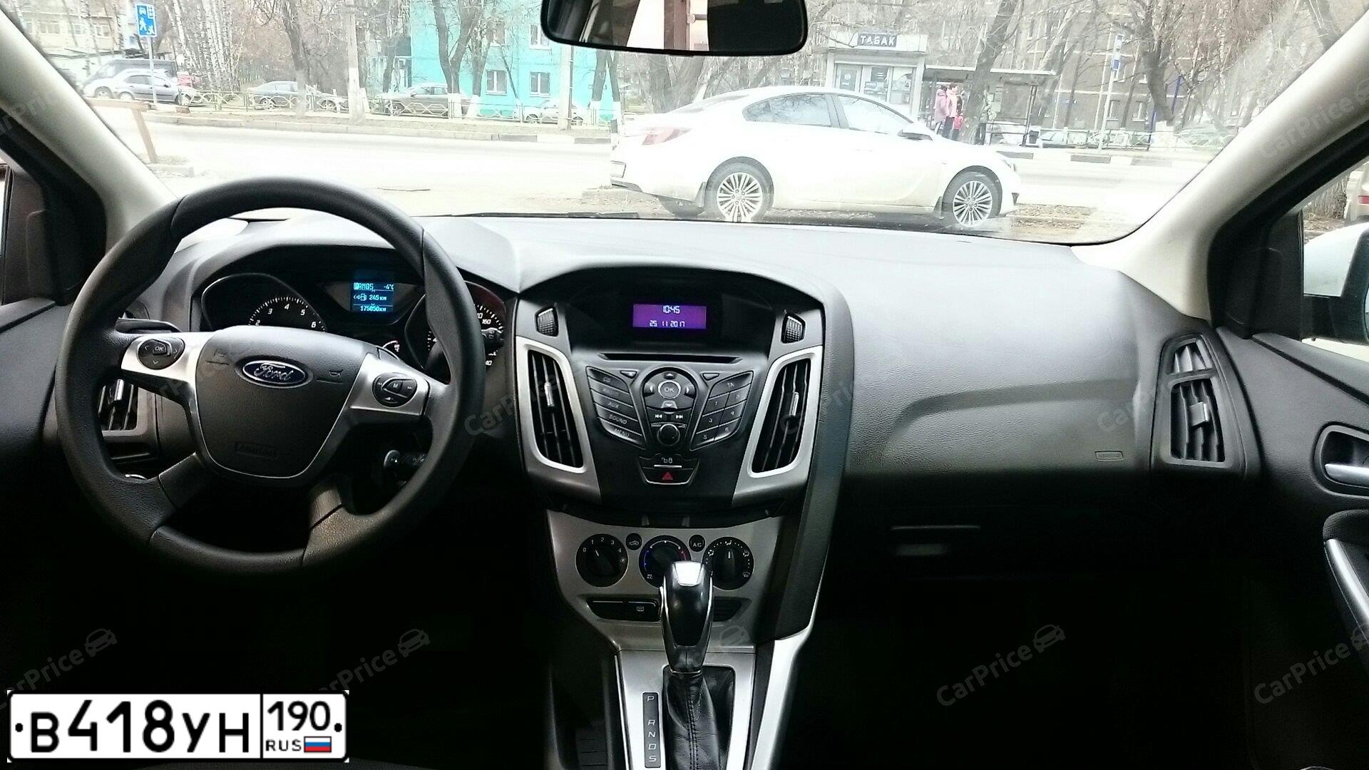 Фото автомобиля FORD FOCUS, 2012 — госномер Е424РВ08. Цвет: Белый