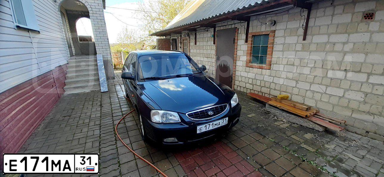 Фото автомобиля TAGAZ ACCENT, 2005 — госномер О049КЕ774. Цвет: ФИОЛЕТОВЫЙ