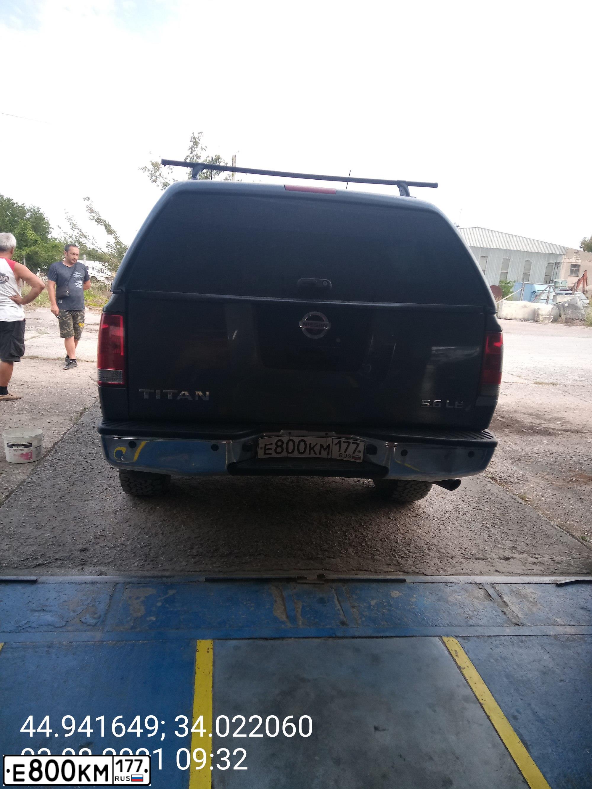 Фото автомобиля NISSAN TITAN, 2006 — госномер Е800КМ177. Цвет: Серый