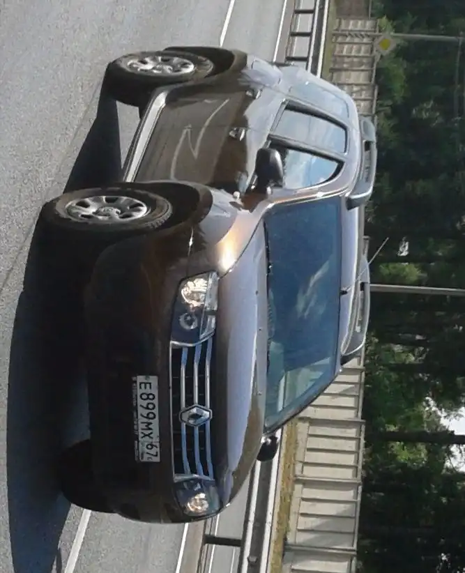 Фото автомобиля RENAULT DUSTER, 2013 — госномер Е899МХ67. Цвет: КОРИЧНЕВЫЙ