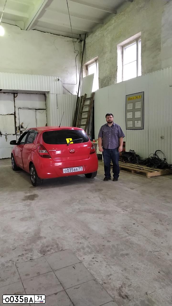 Фото автомобиля HYUNDAI I20, 2009 — госномер Х650АМ71. Цвет: Красный
