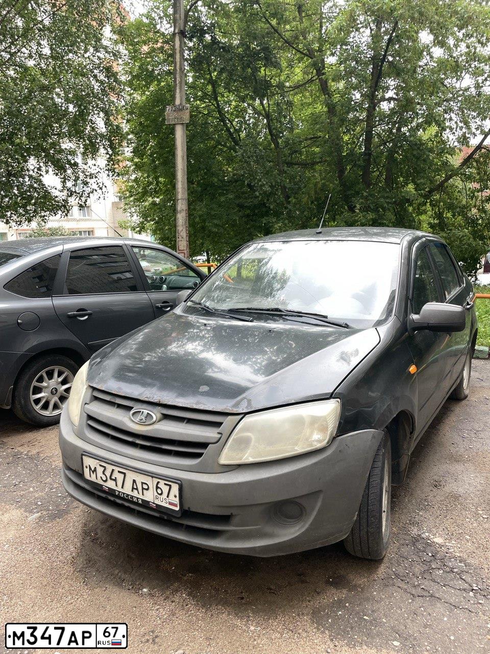 Фото автомобиля LADA 2190 GRANTA, 2013 — госномер М347АР67. Цвет: ЧЕРНЫЙ