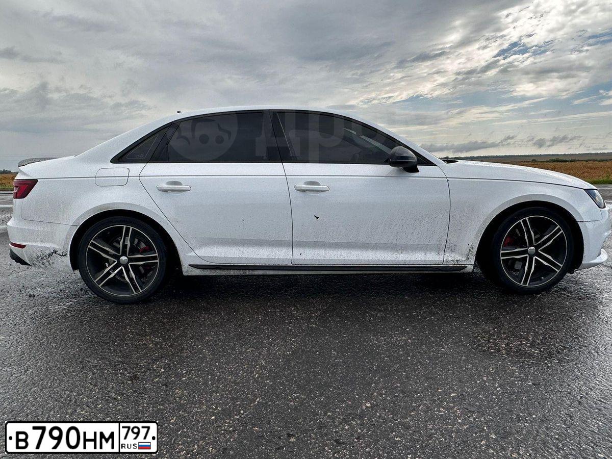 Фото автомобиля AUDI A4, 2018 — госномер К070ХВ32. Цвет: Белый