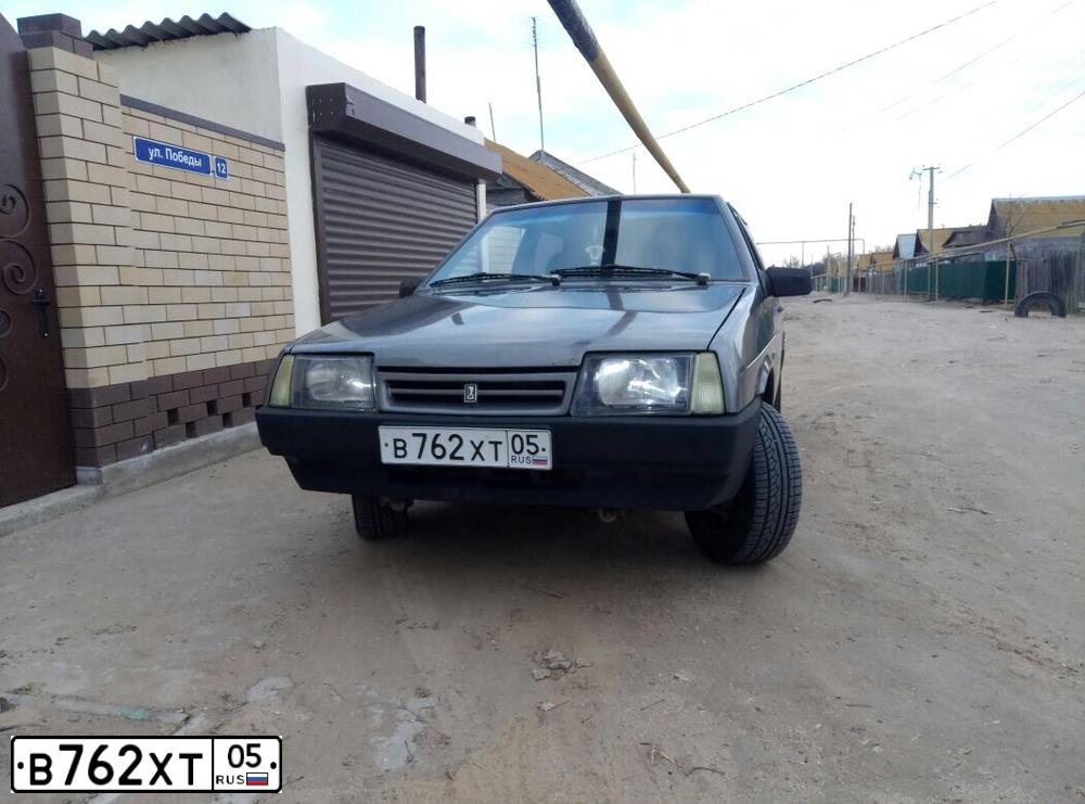 Фото автомобиля LADA 2108 SAMARA, 1994 — госномер М171МТ30. Цвет: ТЕМНО-СЕРЫЙ