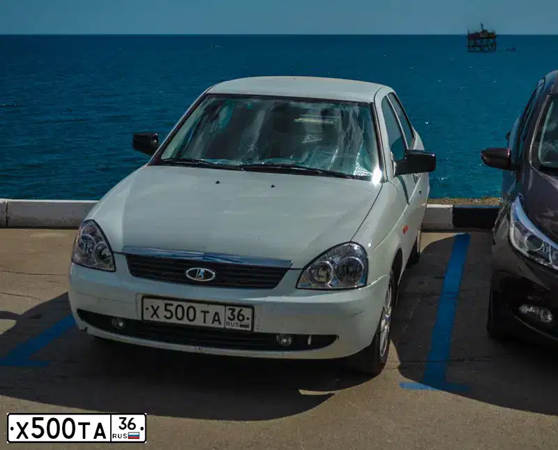 Фото автомобиля LADA 2172 PRIORA, 2010 — госномер Х500ТА36. Цвет: БЕЛЫЙ