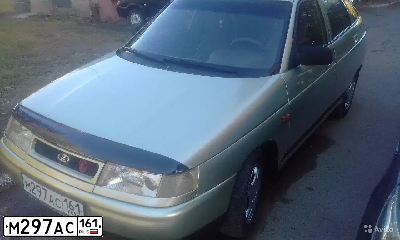 Фото автомобиля LADA 2112, 2003 — госномер М297АС161. Цвет: СЕРЕБ.ЖЕЛТО-ЗЕЛЕНЫЙ