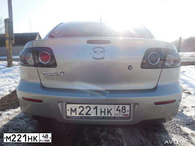 Фото автомобиля MAZDA 3, 2008 — госномер М221НК48. Цвет: СЕРО-ЗОЛОТИСТЫЙ