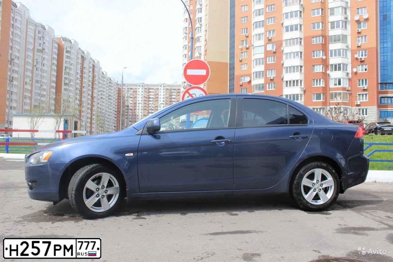 Фото автомобиля MITSUBISHI LANCER, 2007 — госномер Е900НХ13. Цвет: синий