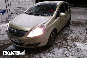 Фото автомобиля OPEL CORSA, 2007 — госномер Е976АТ790. Цвет: СЕРО-ЗОЛОТИСТЫЙ