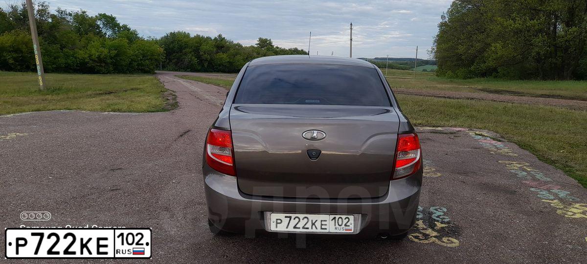 Фото автомобиля LADA 2190 GRANTA, 2013 — госномер Р722КЕ102. Цвет: Золотисто-коричневый