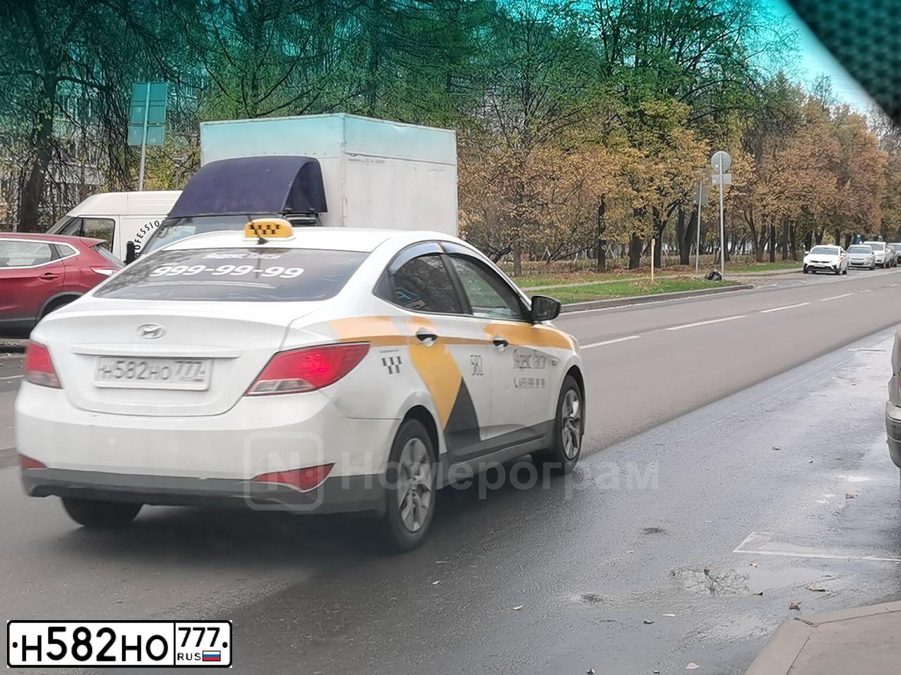 Фото автомобиля HYUNDAI SOLARIS, 2015 — госномер Х917ЕТ37. Цвет: БЕЛЫЙ-ЖЕЛТЫЙ-СЕРЫЙ