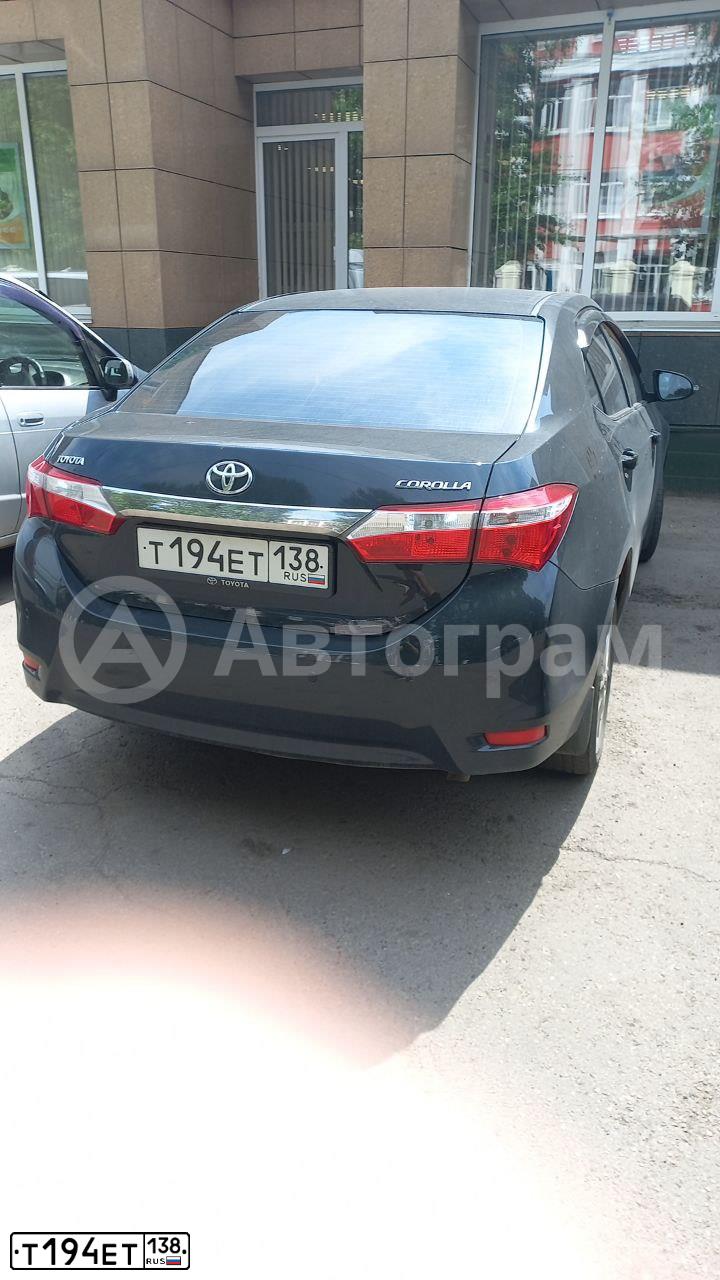 Фото автомобиля TOYOTA COROLLA, 2014 — госномер Т194ЕТ138. Цвет: ЧЕРНЫЙ
