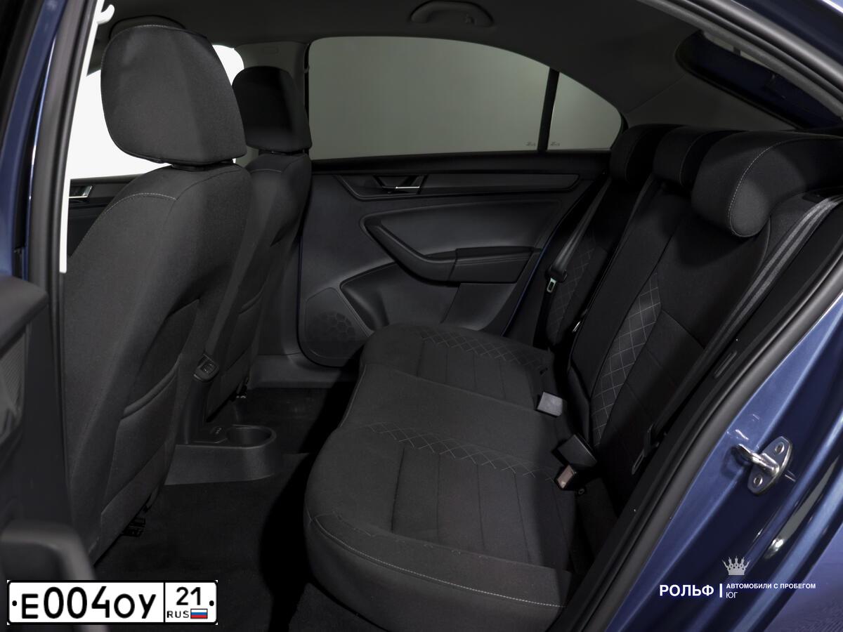 Фото автомобиля SKODA RAPID, 2021 — госномер Е455ВС122. Цвет: синий
