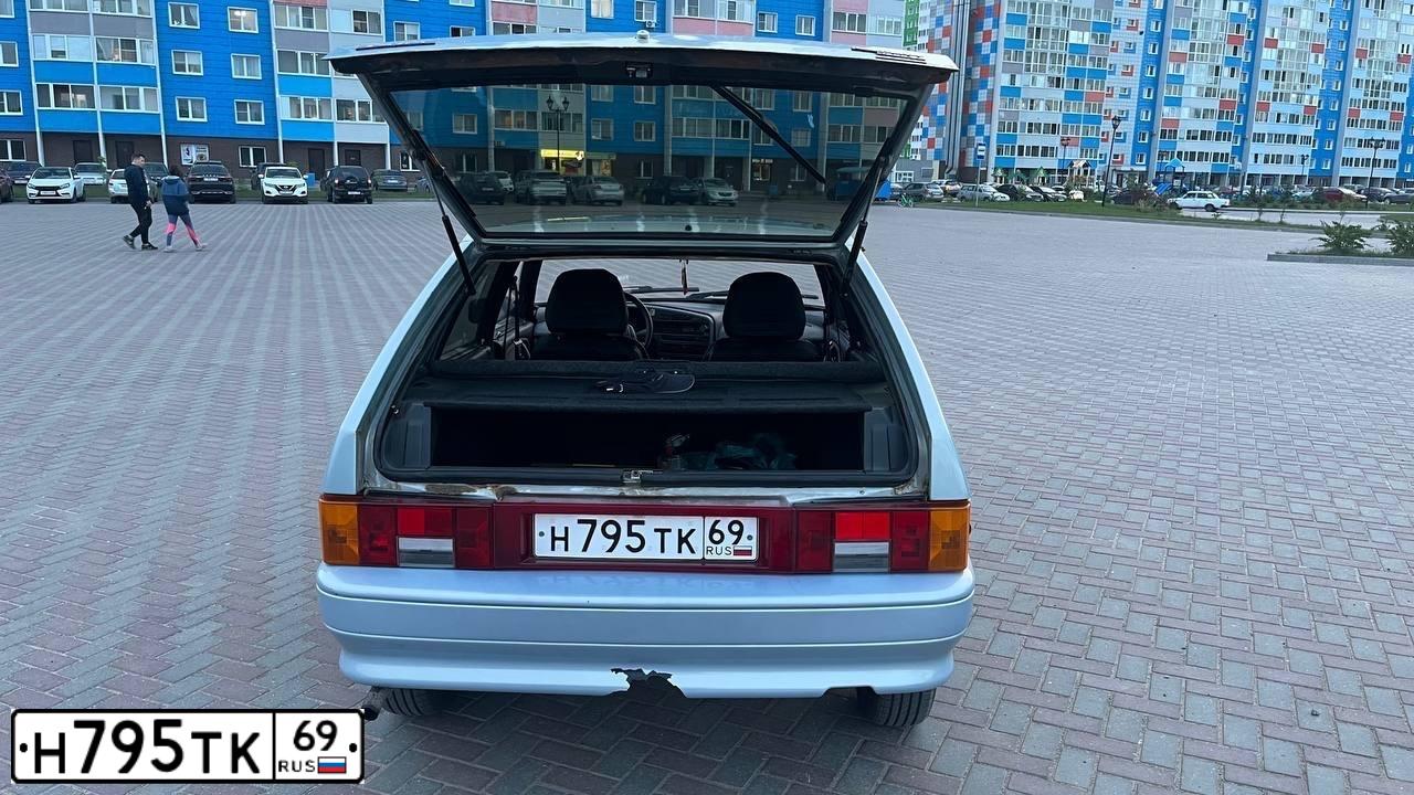 Фото автомобиля LADA 2114 SAMARA, 2004 — госномер Н795ТК69. Цвет: СЕРЕБРИСТО-ЖЕЛТЫЙ
