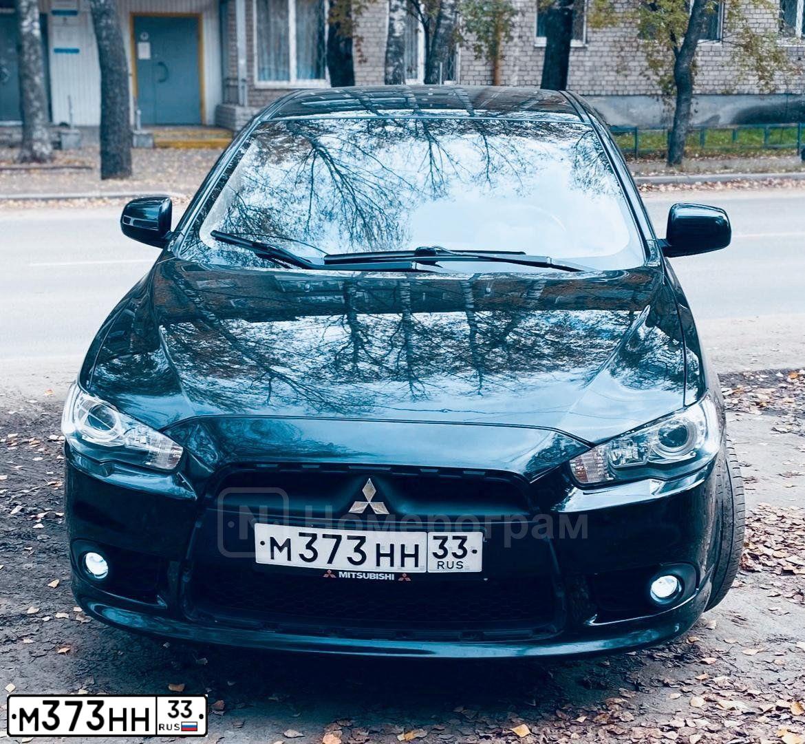Фото автомобиля MITSUBISHI LANCER, 2008 — госномер М373НН33. Цвет: ЧЕРНЫЙ