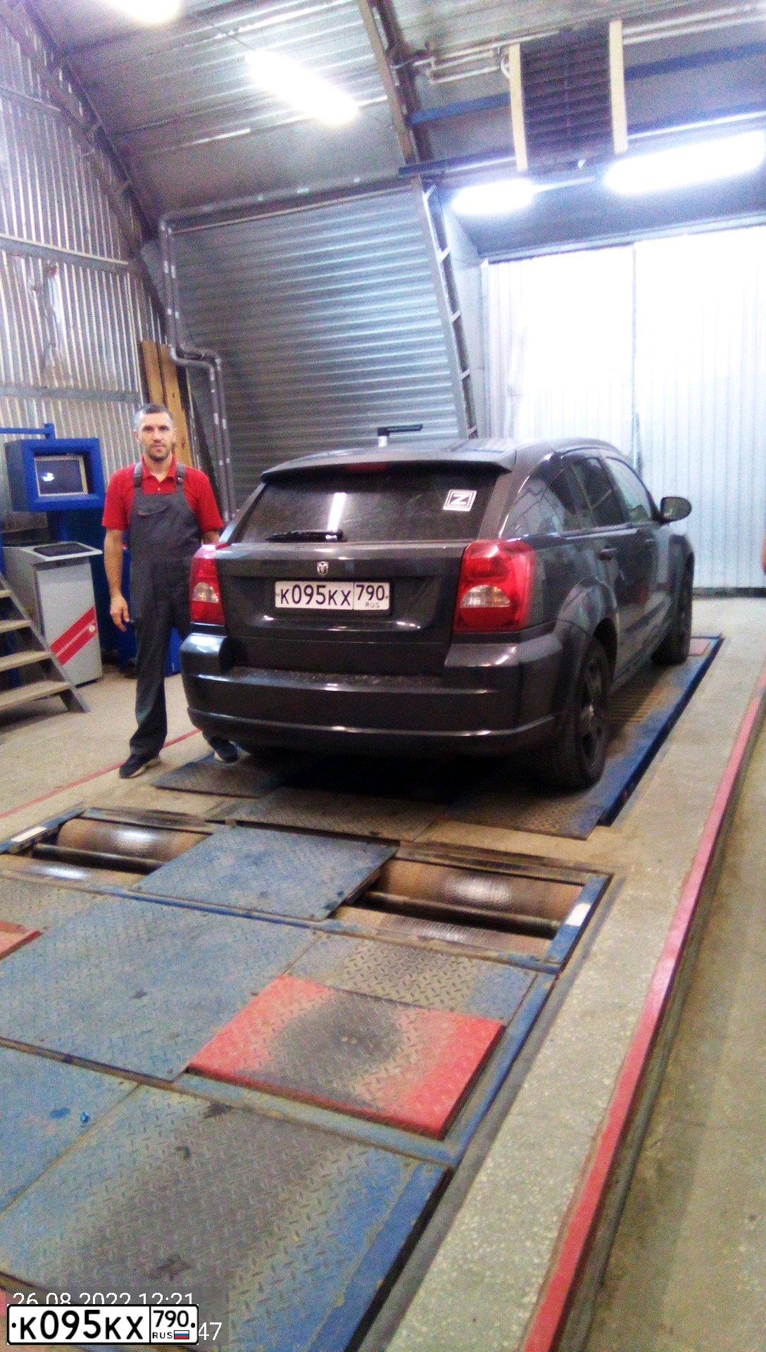 Фото автомобиля DODGE CALIBER, 2007 — госномер К998СО178. Цвет: ТЕМНО-СЕРЫЙ