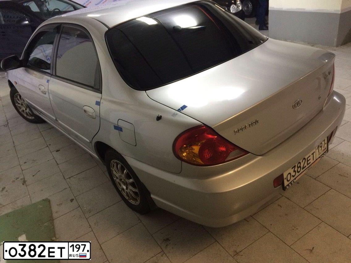 Фото автомобиля KIA SPECTRA, 2006 — госномер Е395УВ62. Цвет: СЕРЫЙ