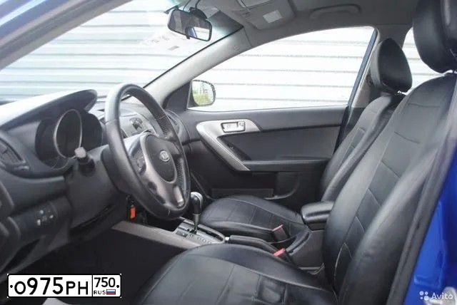 Фото автомобиля KIA CERATO, 2009 — госномер О975РН750. Цвет: синий