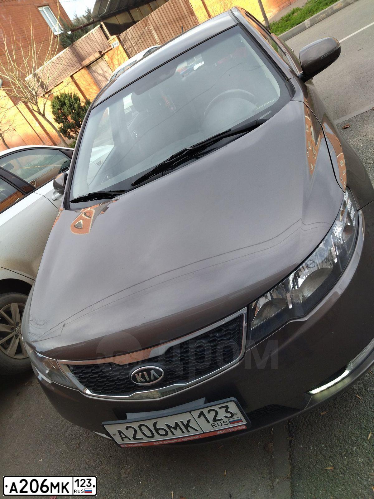 Фото автомобиля KIA CERATO, 2013 — госномер А206МК123. Цвет: БЕЖЕВЫЙ