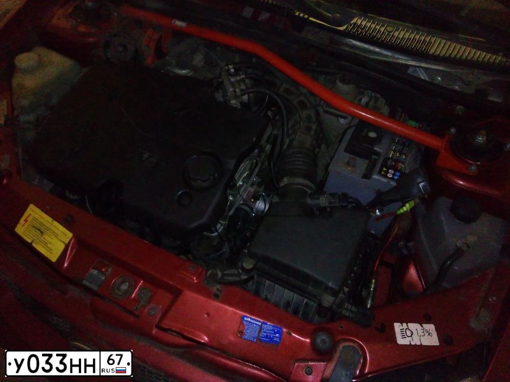 Фото автомобиля LADA 1119 KALINA, 2010 — госномер У033НН67. Цвет: КРАСНЫЙ