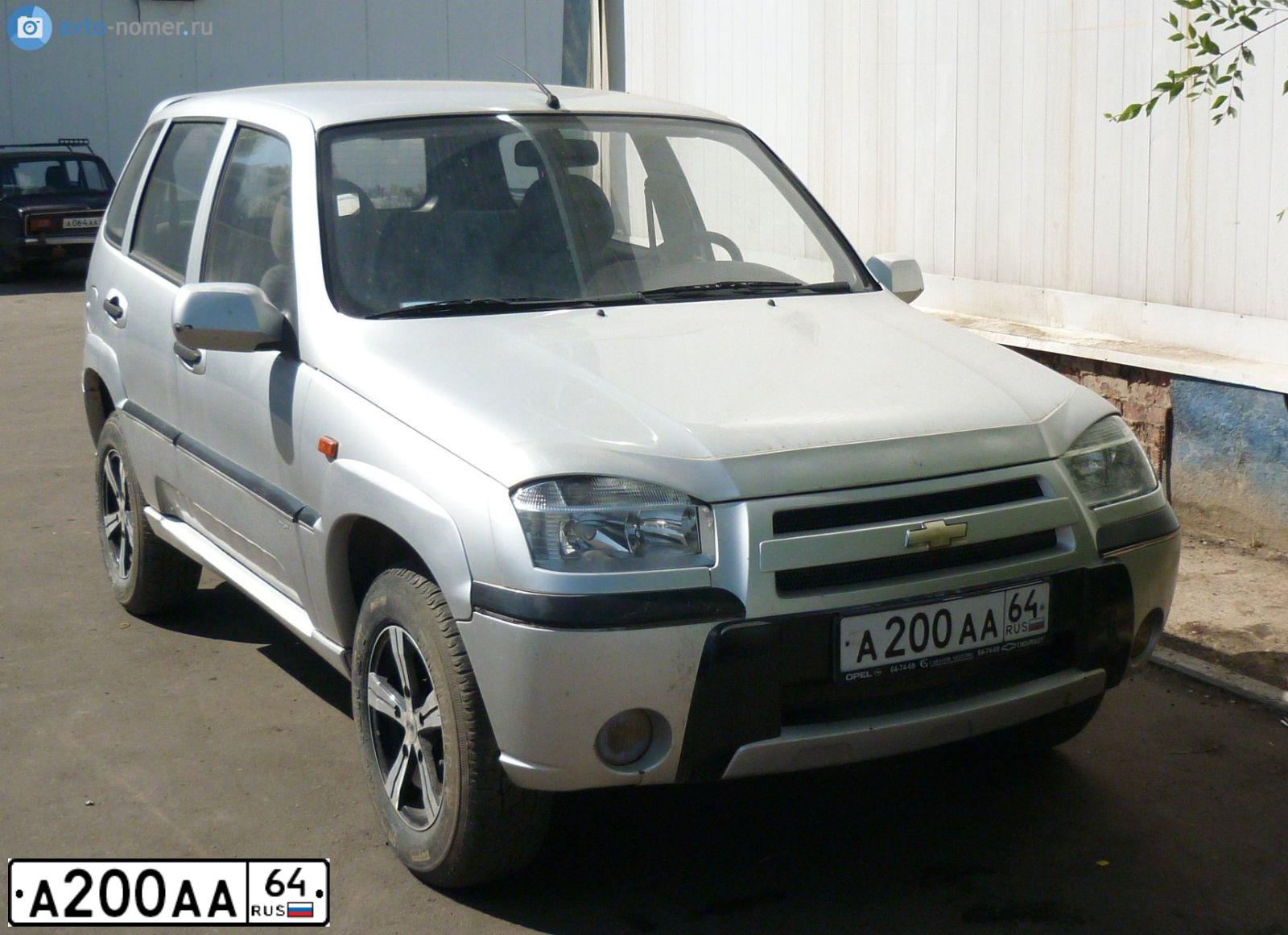Фото автомобиля CHEVROLET NIVA, 2008 — госномер А040ТО164. Цвет: Черно-синий металлик