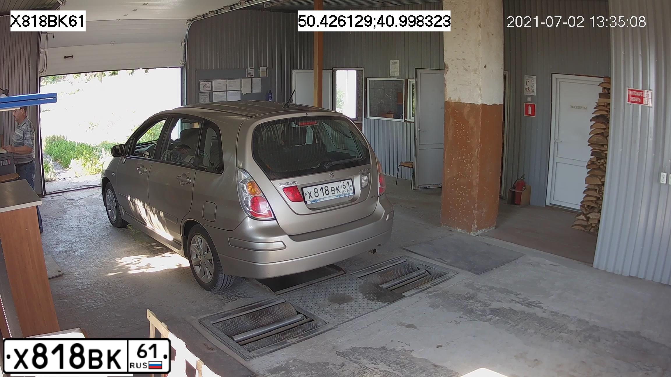 Фото автомобиля SUZUKI LIANA, 2007 — госномер Х818ВК61. Цвет: СЕРЫЙ